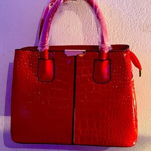 Red leather tote bag
